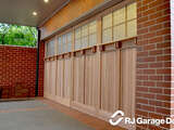 Custom Counterweight Garage Door Clad in 'Carriage Style' with Windows